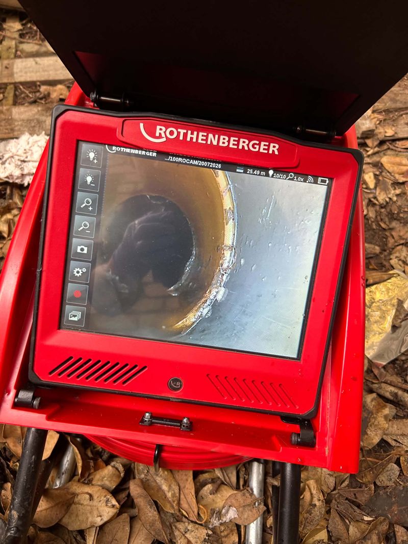 Rothenberger drain camera screen showing an obstruction inside a pipe, with the on-screen distance reading 25.49 metres